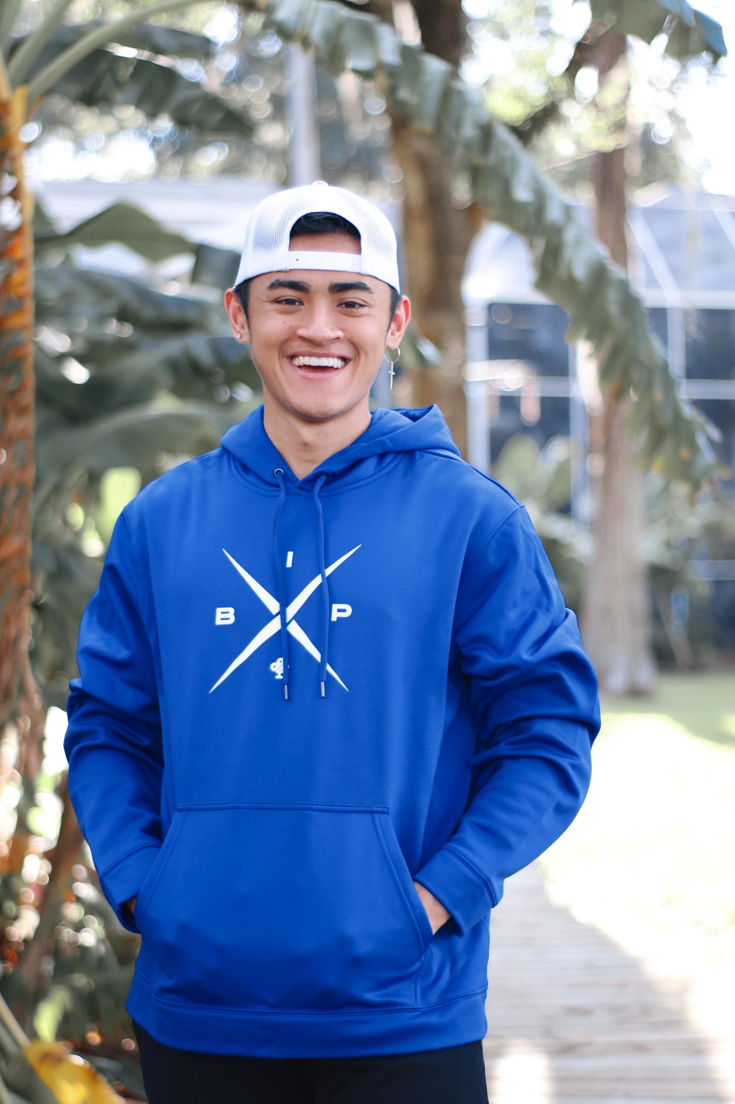 X logo 2.0 - printed on a Royal Blue Premium Dry Fit hoodie by Ireland Boys productions viral youtube channel featuring Ricky Ireland