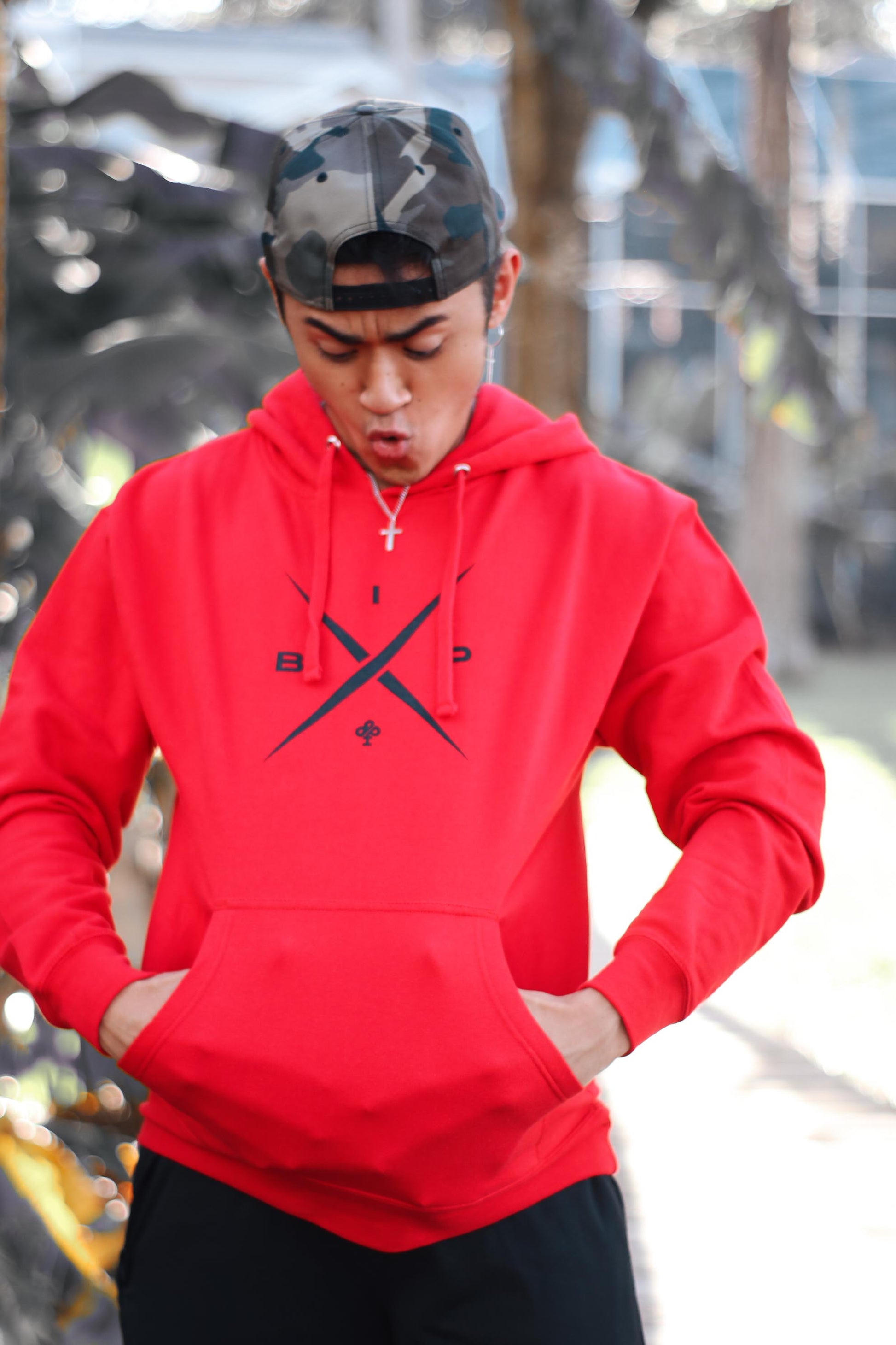 X Logo 2.0  om a red  Premium dry fit hoodie by Ireland Boys productions viral youtube channel featuring Ricky Ireland