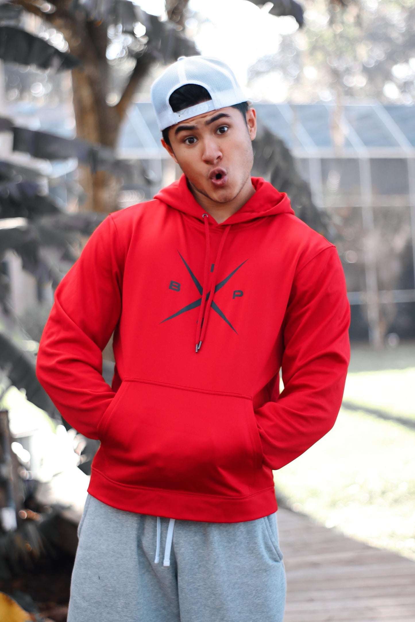 X logo 2.0 - printed on a Red Premium Dry Fit hoodie by Ireland Boys productions viral youtube channel featuring Nick Ireland