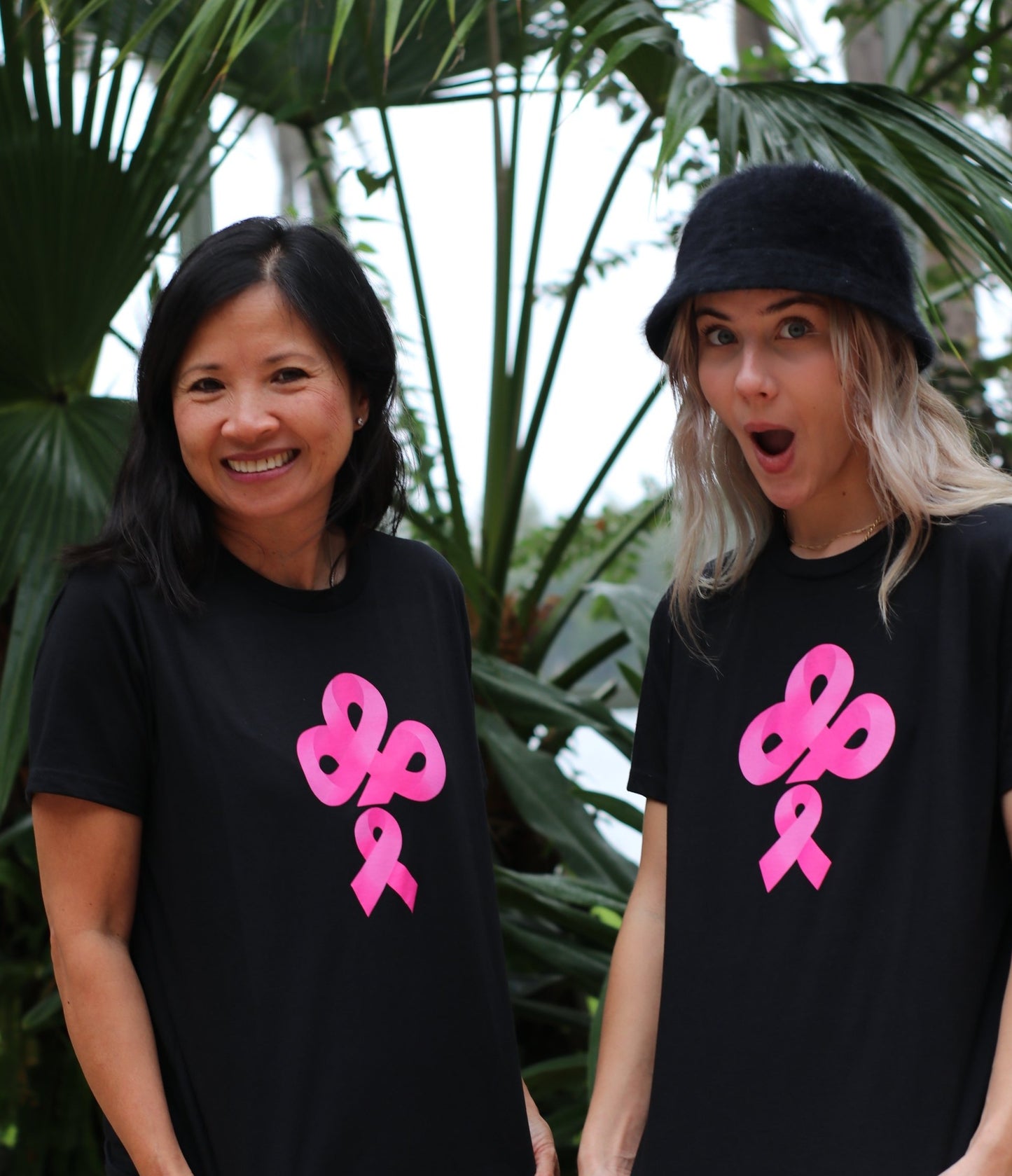 Help Fight Breast Cancer with the purchase of the IBP Ireland Boys pink ribbon logo on black nextlevel t-shirt worn by Morgan and IBM of Ireland Boys Productions