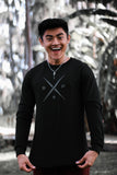 Ricky Ireland wearing the Ireland Boys Productions introduces STEALTH merch ft X 2.0 logo in Asphalt Grey printed on Bela Canvas long sleeve premium T-shirt