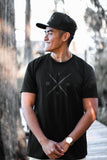 Introducing Ricky Ireland wearing the Ireland Boys Productions STEALTH merch ft X 2.0 logo in Asphalt Grey printed on NEXT LEVEL premium T-shirt