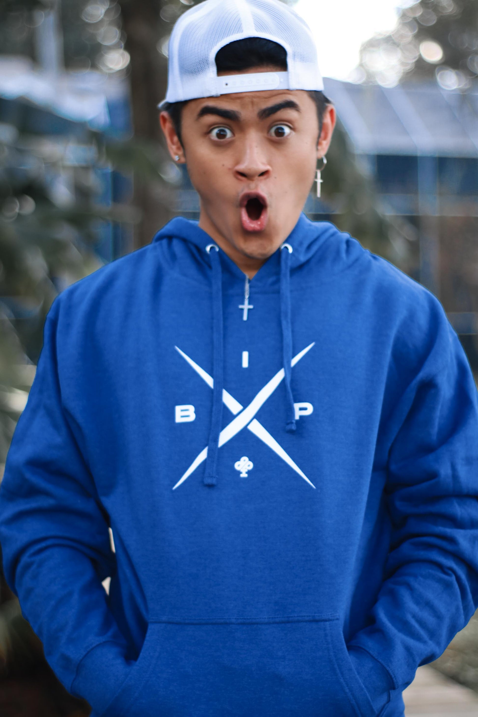 X Logo 2.0  om a royal blue  Premium dry fit hoodie by Ireland Boys productions viral youtube channel featuring Ricky Ireland