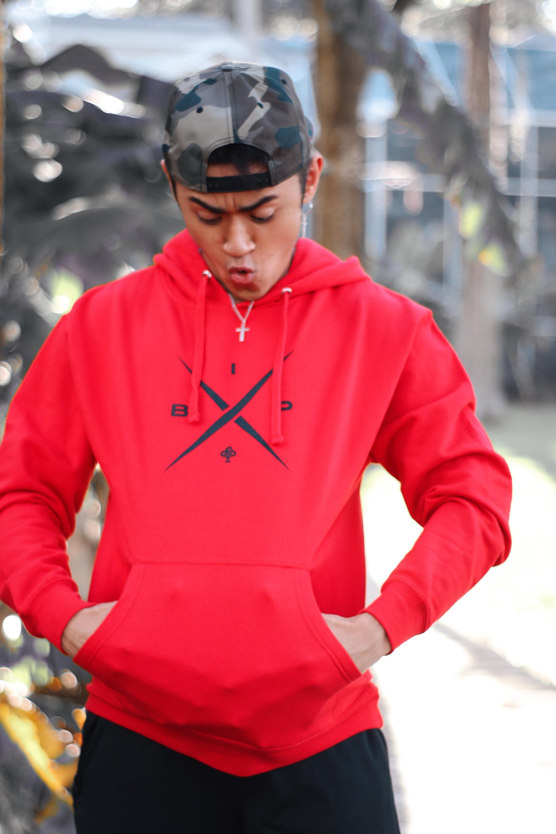 X Logo 2.0  om a red  Premium dry fit hoodie by Ireland Boys productions viral youtube channel featuring Ricky Ireland